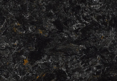 Armitage stone surface featuring deep black base with gray veining and golden accents — custom countertops fabricated and installed by Signature Stone LV
