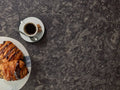 Ashbourne Matte kitchen surface with dark gray veined pattern and matte finish — elegant stone countertops installed by Signature Stone Las Vegas