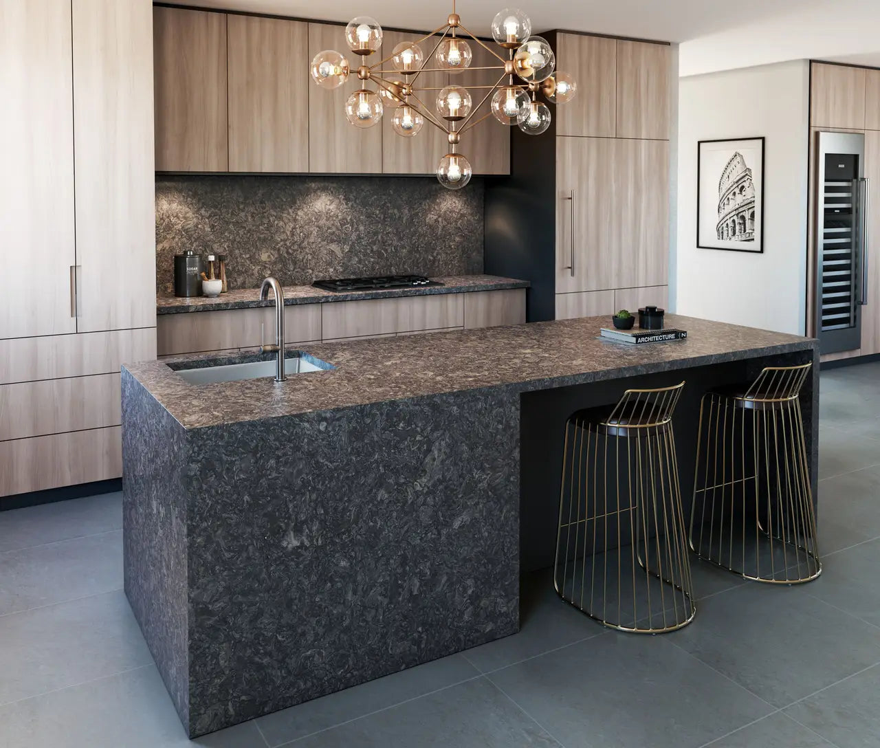 Ashbourne Matte kitchen island with dark veined surface and matching backsplash — expert countertop fabrication by Signature Stone Las Vegas
