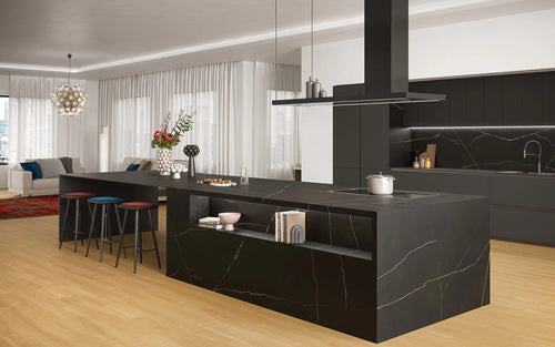 Black Atlantis quartz kitchen island with white veining and waterfall edges — custom countertops fabricated and installed by Signature Stone LV