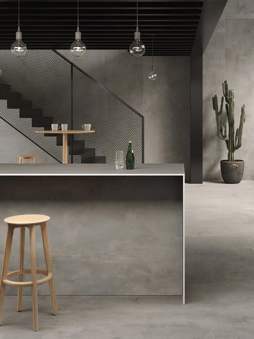 Boost Grey quartz kitchen island with sleek matte finish and straight edges — modern stone countertops installed by Signature Stone Las Vegas