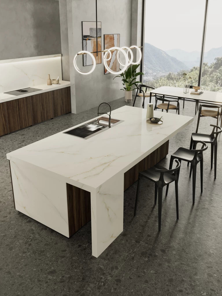 Calacatta Apuano kitchen island with white marble veining and waterfall edges — premium stone countertops installed by Signature Stone Las Vegas