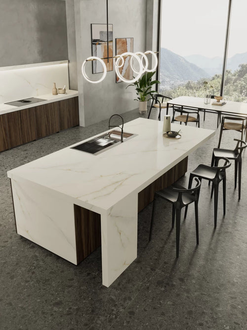 Calacatta Apuano kitchen island with white marble veining and waterfall edges — premium stone countertops installed by Signature Stone Las Vegas