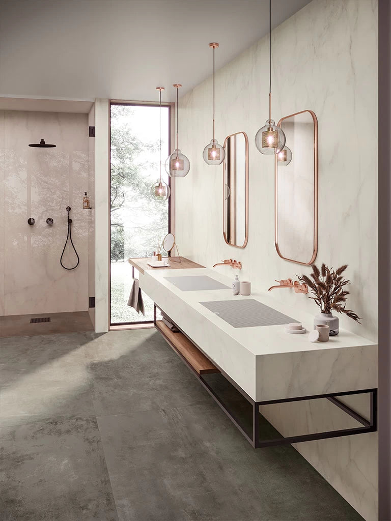 Calacatta Delicato bathroom vanity with white veining and polished finish — elegant stone countertops installed by Signature Stone Las Vegas