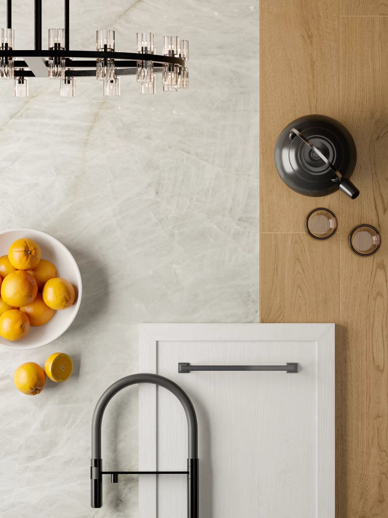 Crystal White stone kitchen surfaces with marble-like veining and polished finish — custom countertops fabricated and installed by Signature Stone LV