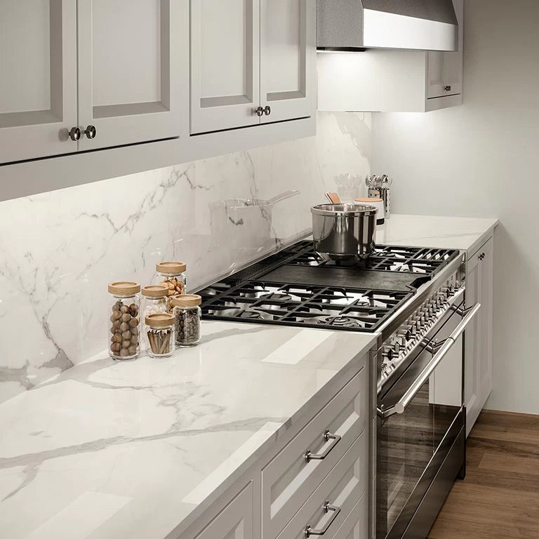 Statuario Supremo kitchen countertops with white marble veining and polished finish — custom countertops fabricated and installed by Signature Stone LV