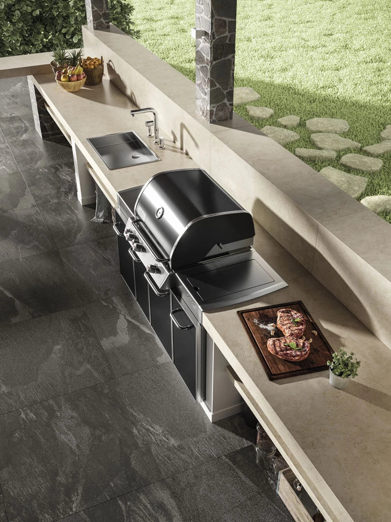 Cream Prestige outdoor kitchen with light beige finish and integrated grill station — premium stone countertops installed by Signature Stone Las Vegas