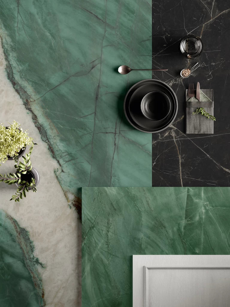 Exotic marble flooring with stunning green veining and black accent tiles — premium stone countertops installed by Signature Stone Las Vegas