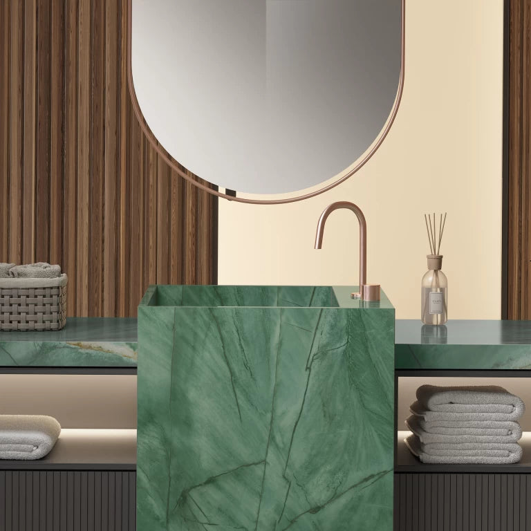 Exotic Green marble bathroom vanity with rich emerald veining and polished finish — premium stone countertops installed by Signature Stone Las Vegas