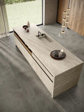 Travertino Pearl kitchen island with integrated sink featuring light beige finish and clean lines — premium stone countertops installed by Signature Stone La...