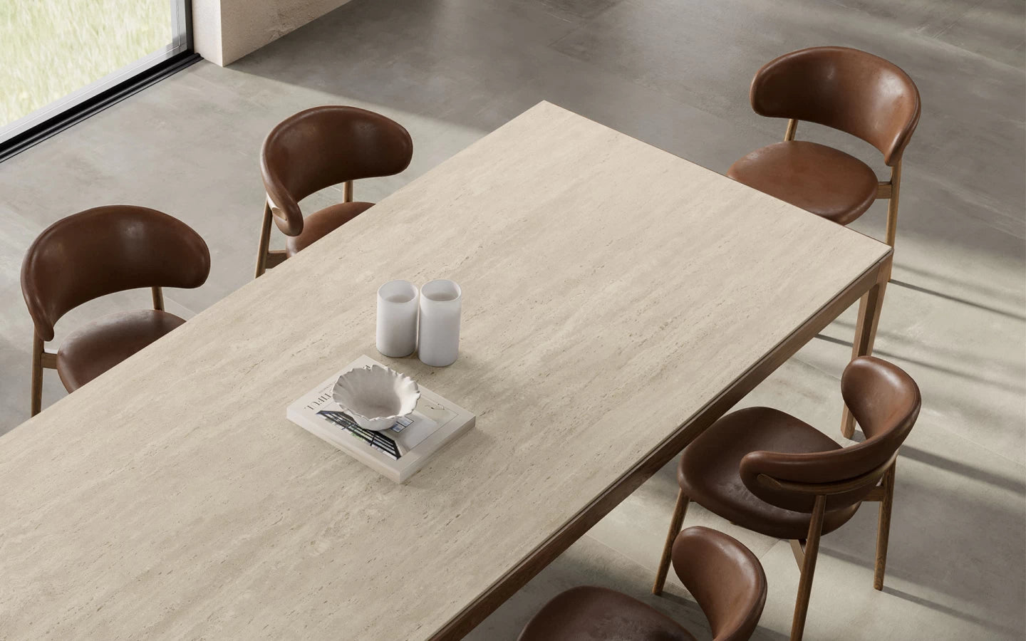 Travertino Pearl dining table surface with light beige finish and natural veining — elegant stone countertops installed by Signature Stone Las Vegas