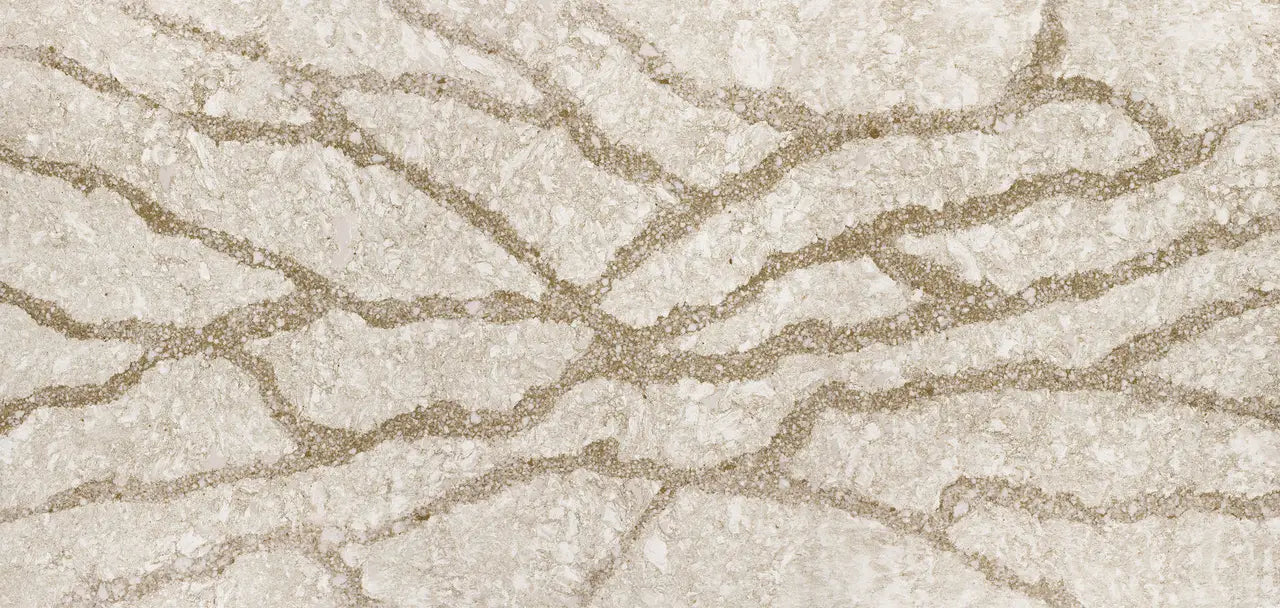 Quartz slab surface with cream and beige veining in polished finish — premium countertop fabrication by Signature Stone Las Vegas