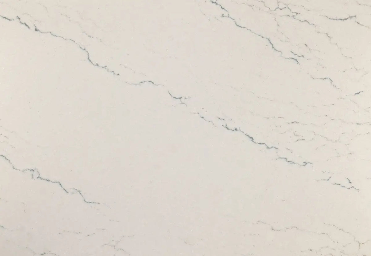 Beckington quartz surface with soft white base and subtle gray veining in polished finish — custom countertops fabricated and installed by Signature Stone LV