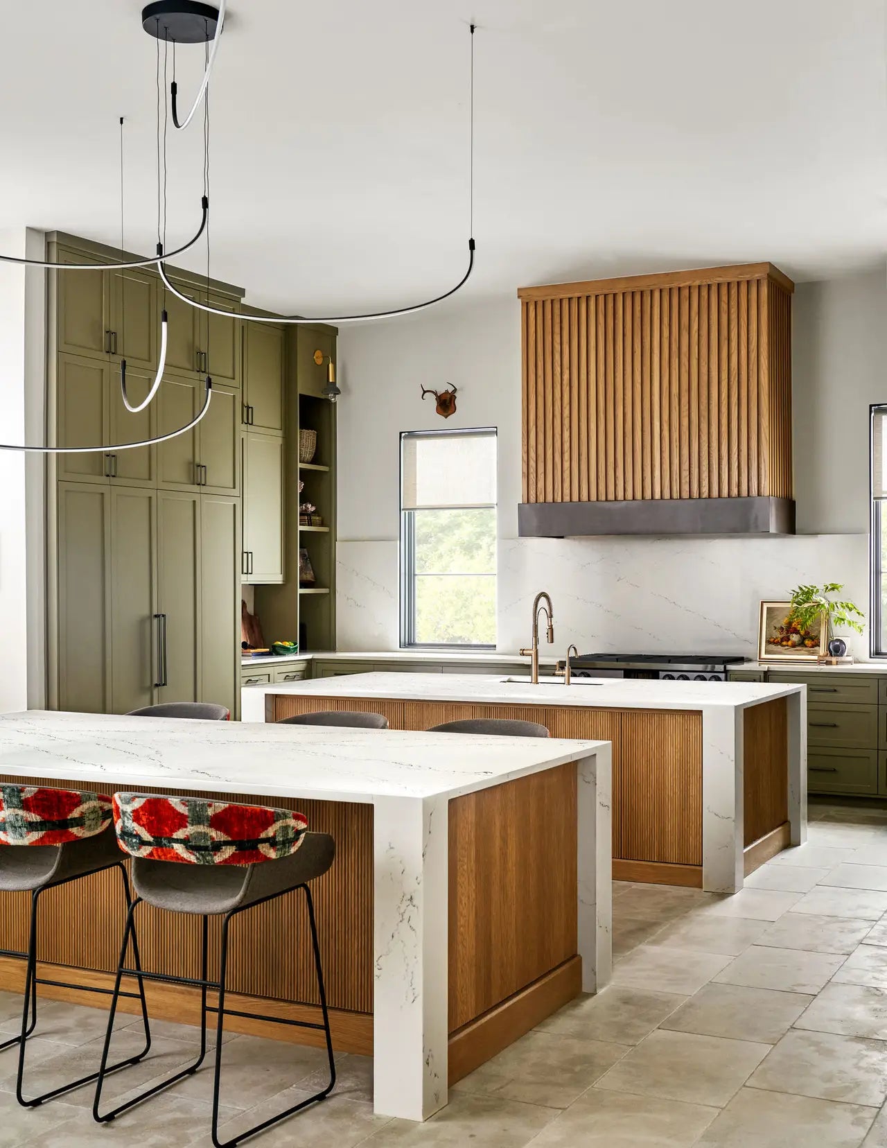 Beckington quartz kitchen island and perimeter countertops with white veining and waterfall edge — elegant stone countertops installed by Signature Stone Las...