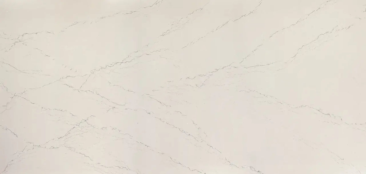 Beckington quartz surface with cream base and subtle gray veining in polished finish — premium countertop fabrication by Signature Stone Las Vegas