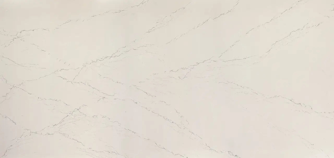 Beckington quartz surface with cream base and subtle gray veining in polished finish — premium countertop fabrication by Signature Stone Las Vegas