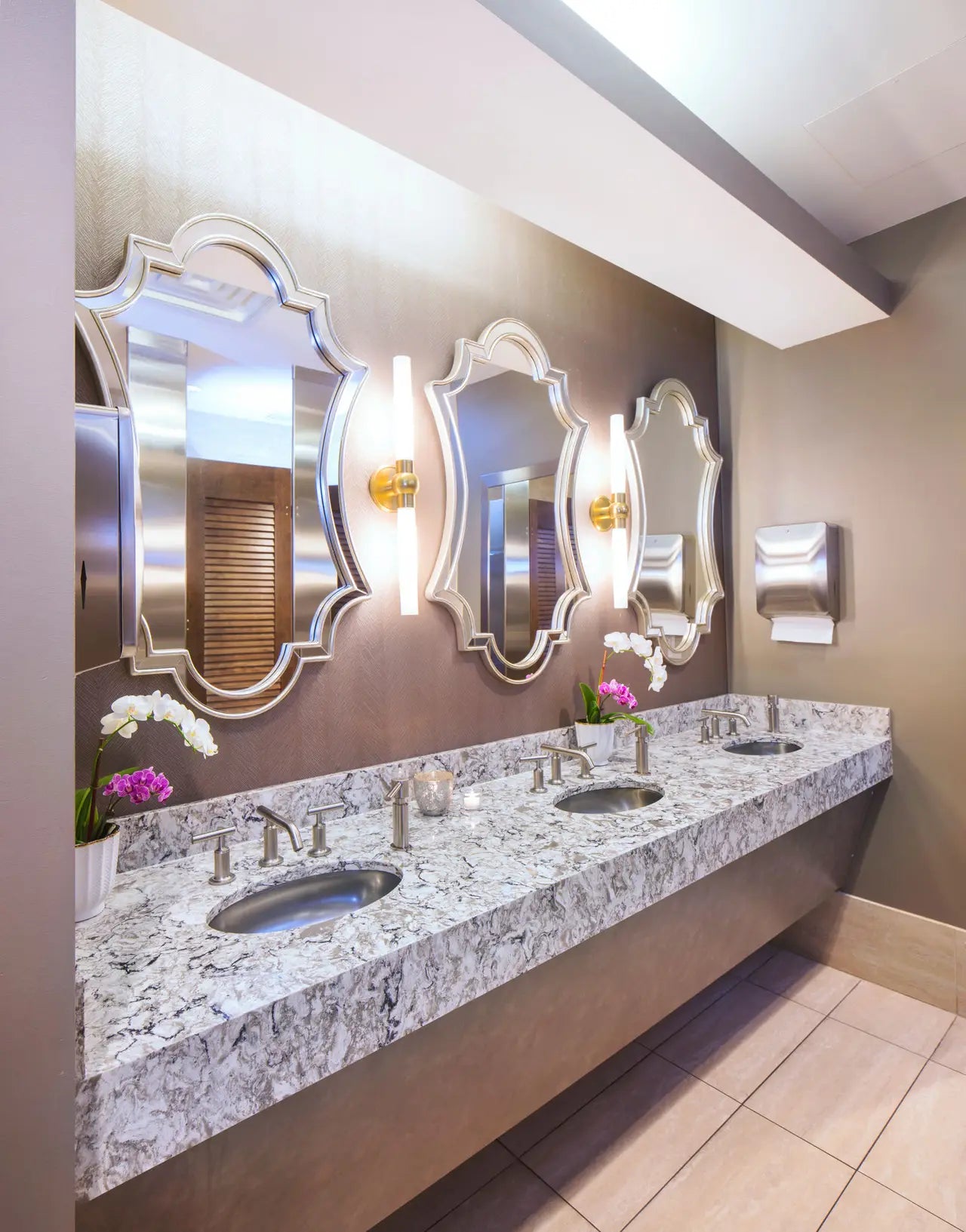 White granite bathroom vanity with gray veining and polished finish — elegant stone countertops installed by Signature Stone Las Vegas