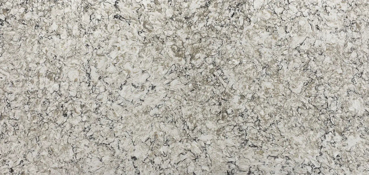 Bellingham quartz slab with light gray base and intricate dark veining throughout — custom countertops fabricated and installed by Signature Stone LV
