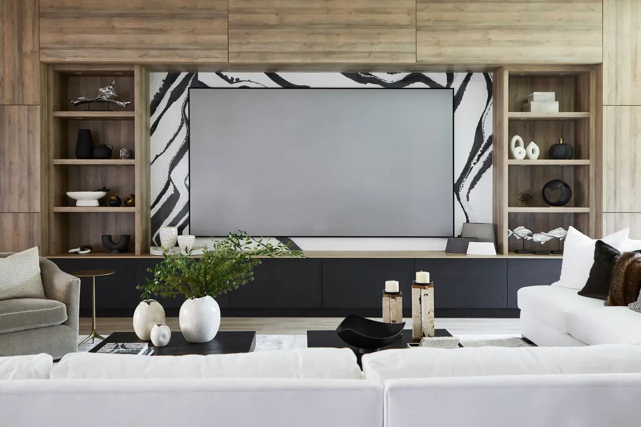 Natural stone entertainment center with white and black veining in modern living room — expert countertop fabrication by Signature Stone Las Vegas