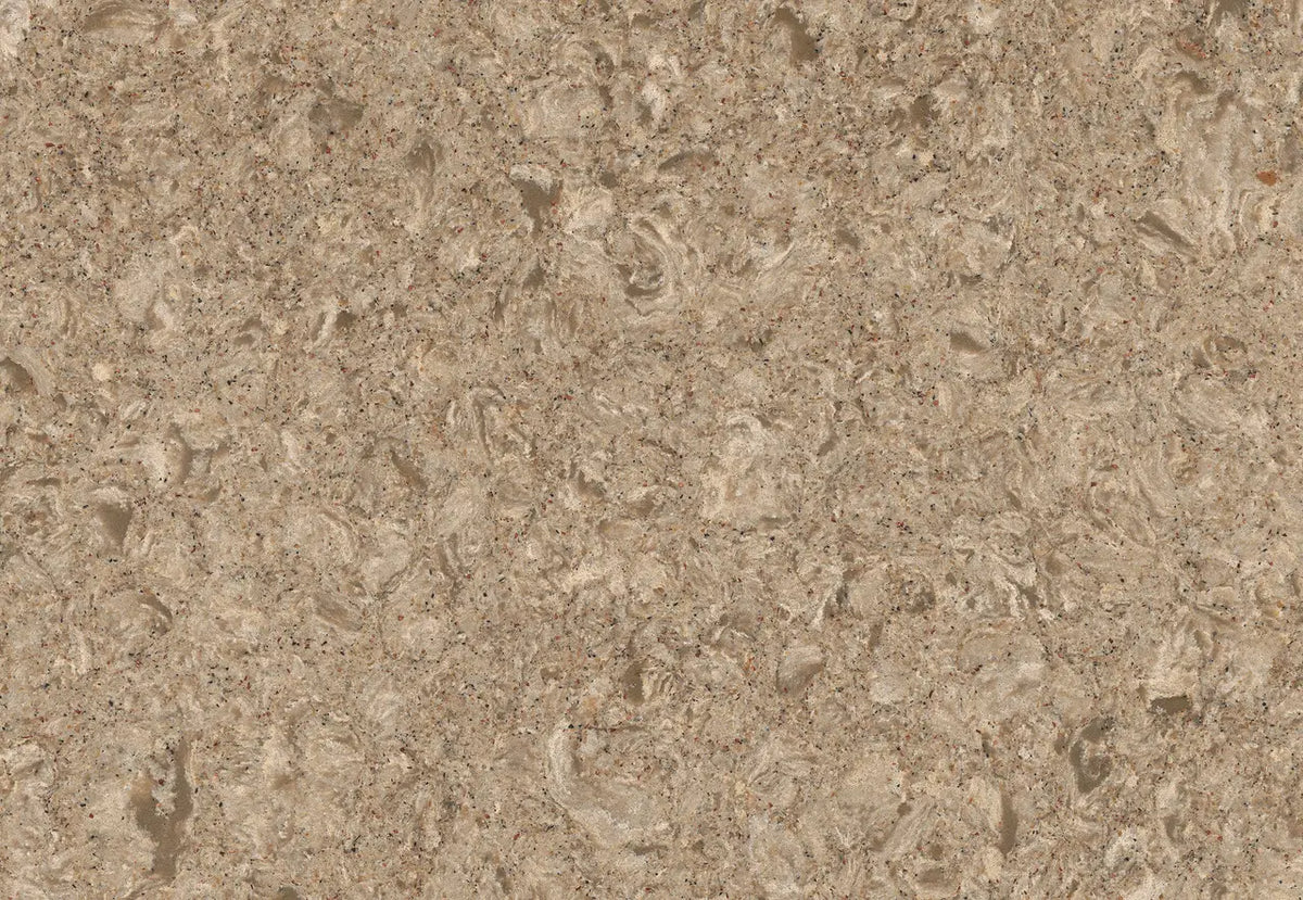 Quartz slab surface with warm beige tones and subtle fossil-like patterns — ideal for custom countertops fabricated and installed by Signature Stone LV