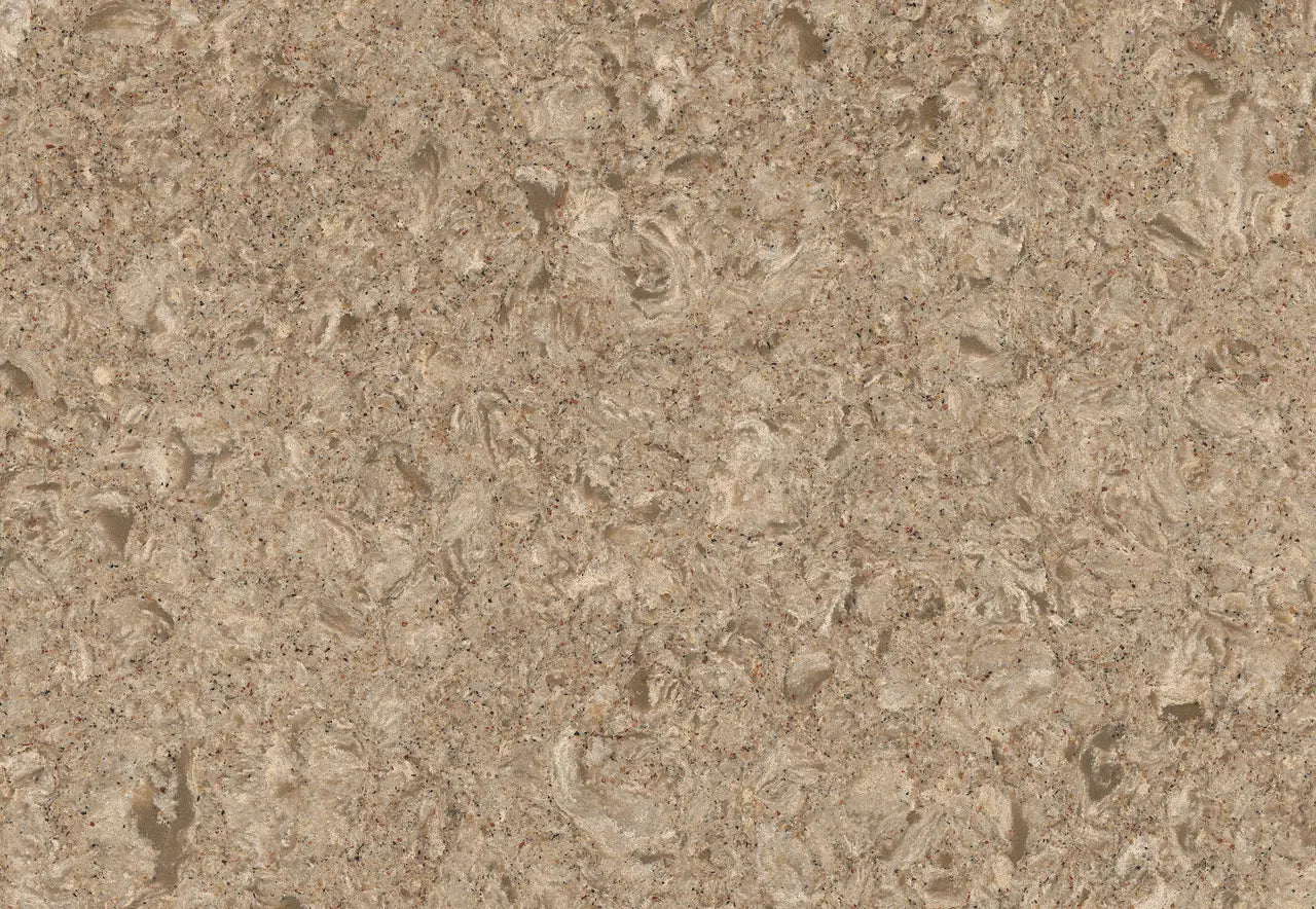 Quartz slab surface with warm beige tones and subtle fossil-like patterns — ideal for custom countertops fabricated and installed by Signature Stone LV