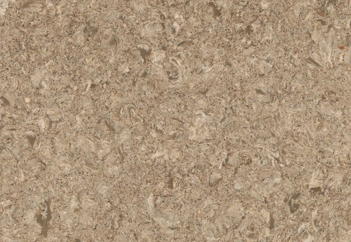 Quartz slab surface with warm beige tones and subtle fossil-like patterns — ideal for custom countertops fabricated and installed by Signature Stone LV