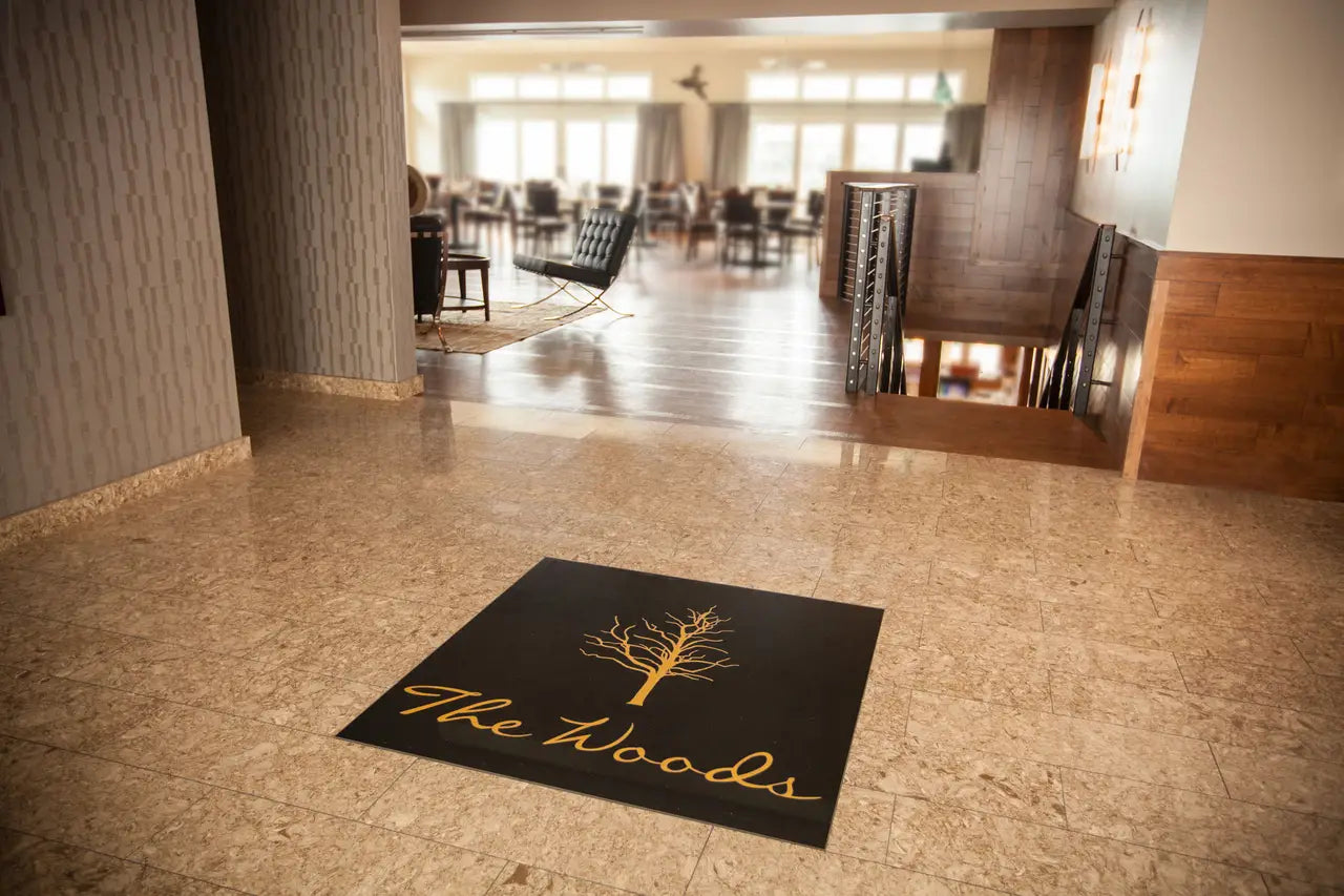 Natural stone flooring with speckled beige granite tiles and polished finish — premium stone countertops installed by Signature Stone Las Vegas