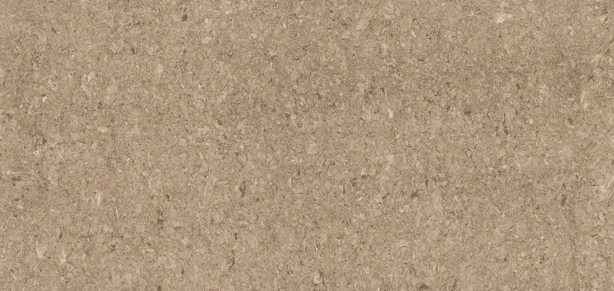 Quartz surface with warm beige tones and subtle speckled texture — premium countertop fabrication by Signature Stone Las Vegas