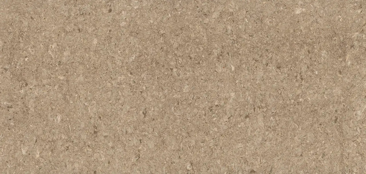 Quartz surface with warm beige tones and subtle speckled texture — premium countertop fabrication by Signature Stone Las Vegas