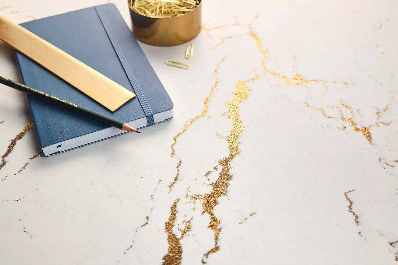 Berkshire Brass Satin Ridge surface with golden veining and smooth finish — premium stone countertops installed by Signature Stone Las Vegas