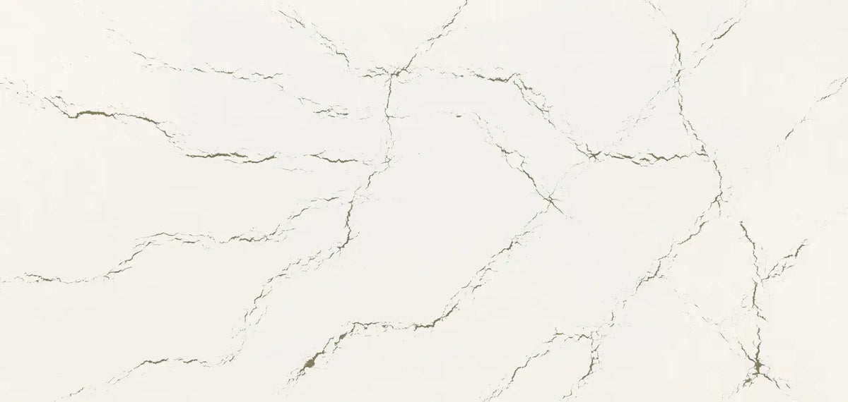 Berkshire Brass quartz slab with satin finish and delicate veining — premium countertop fabrication by Signature Stone Las Vegas