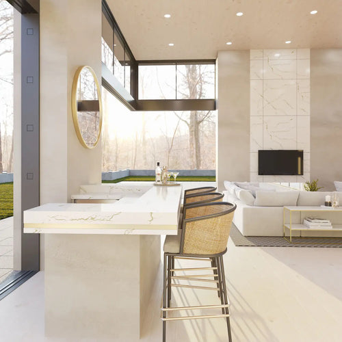Berkshire Brass Sculpted quartz kitchen island with white marble veining and waterfall edge — elegant stone countertops installed by Signature Stone Las Vegas