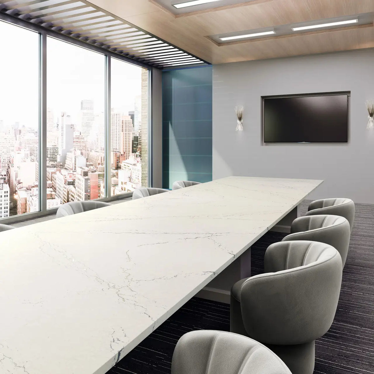 Berkshire Steel Sculpted conference table with white marble-look finish — premium stone countertops installed by Signature Stone Las Vegas