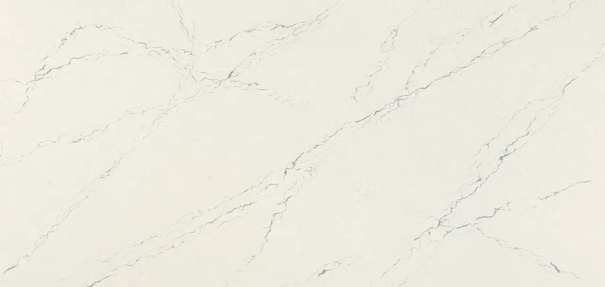 Berkshire Steel Sculpted quartz slab with cream base and gray veining — custom countertops fabricated and installed by Signature Stone LV