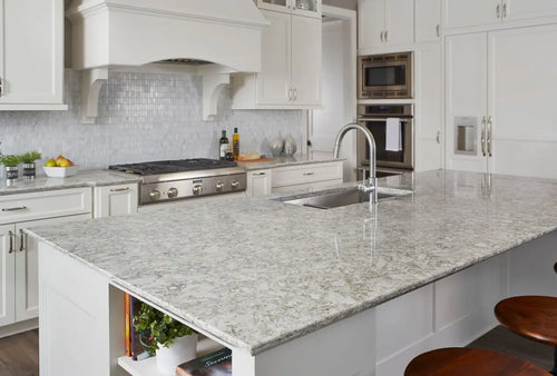 Berwyn quartz kitchen island with light gray veining and polished finish — elegant stone countertops installed by Signature Stone Las Vegas