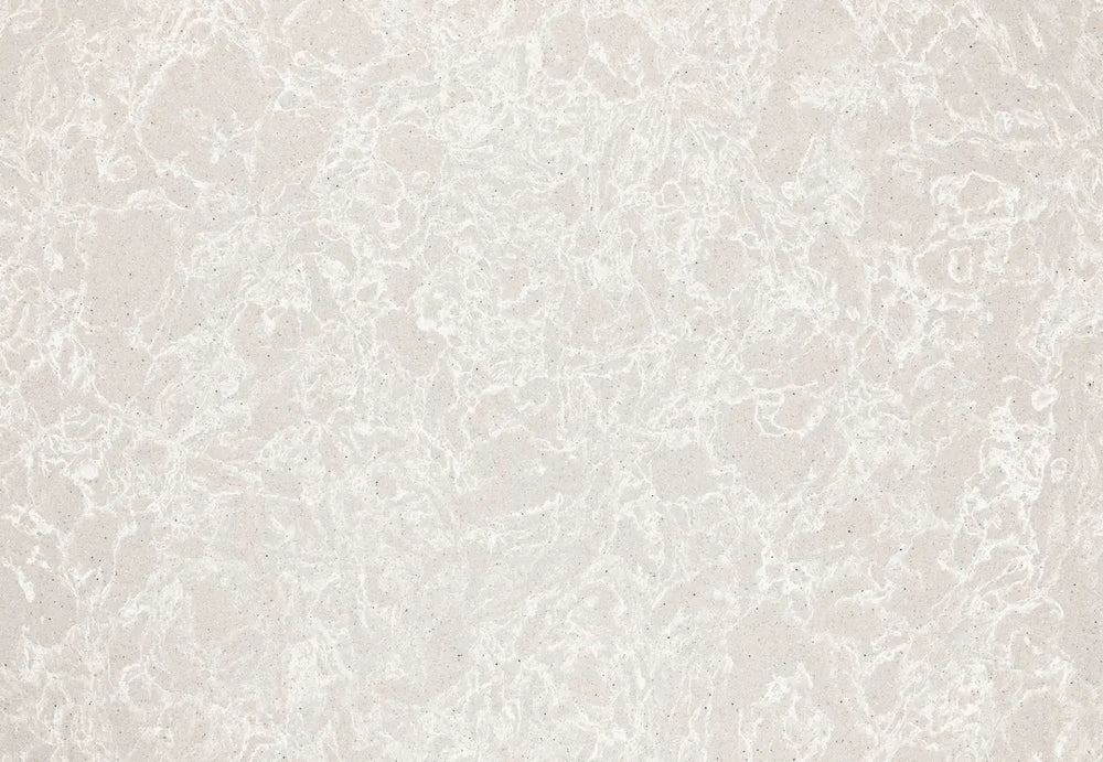 Big Sur Mist quartz surface with soft beige tones and subtle veining — custom countertops fabricated and installed by Signature Stone LV