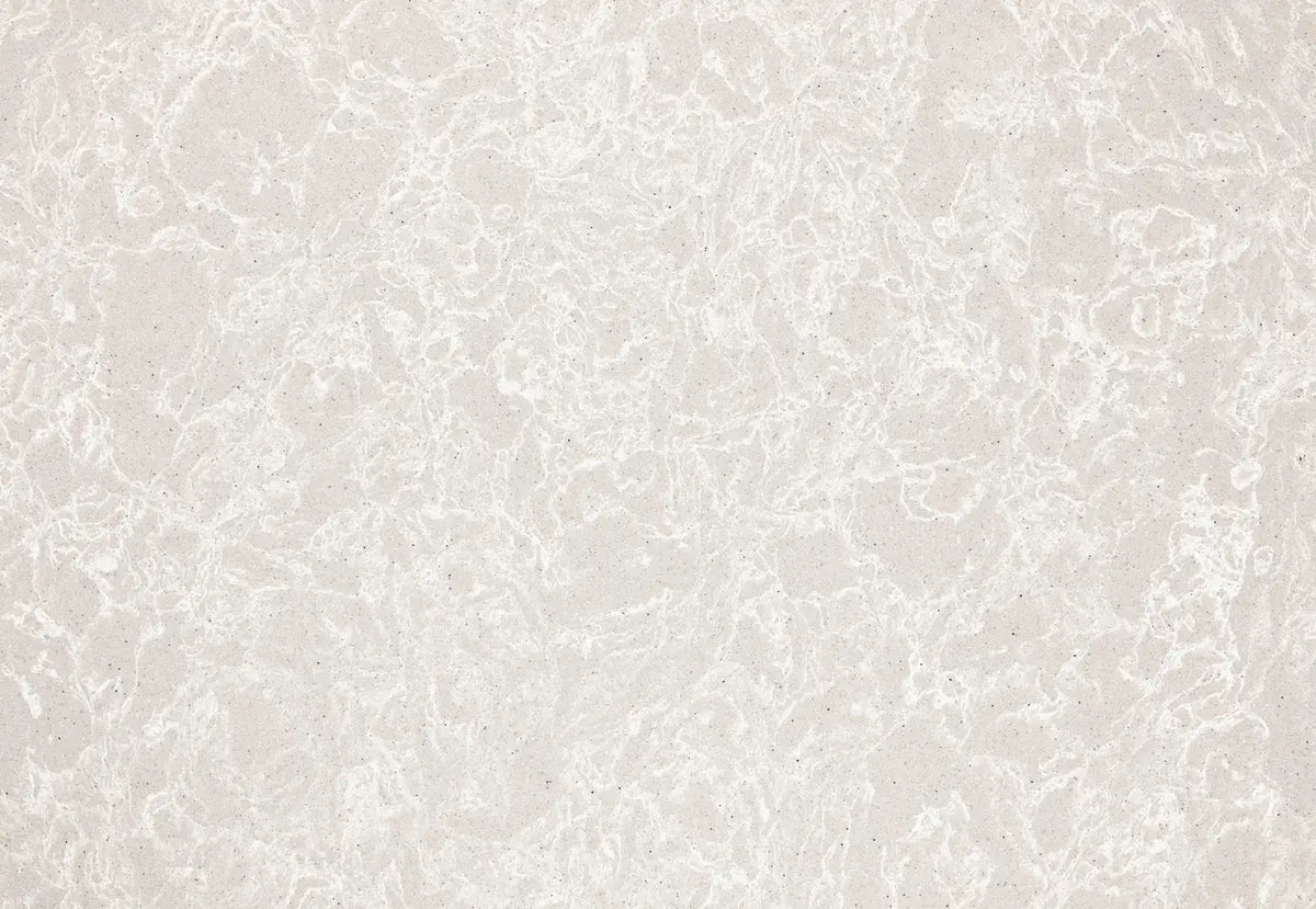 Big Sur Mist quartz surface with soft beige tones and subtle veining — custom countertops fabricated and installed by Signature Stone LV