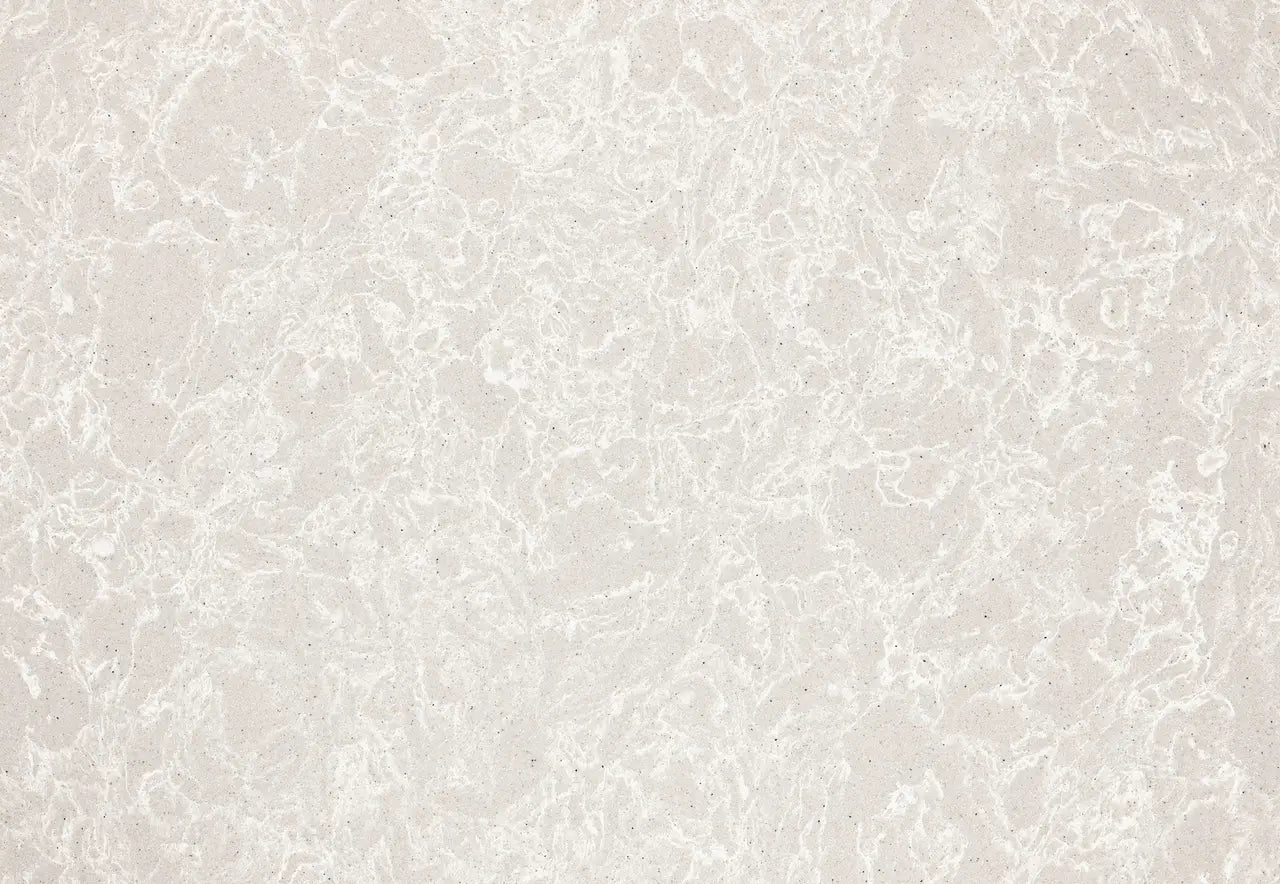 Big Sur Mist quartz surface with soft beige tones and subtle veining — custom countertops fabricated and installed by Signature Stone LV