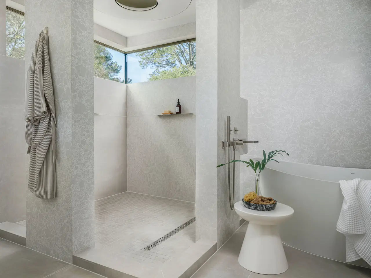 Big Sur Mist stone bathroom featuring light gray surfaces with subtle veining — premium countertop fabrication by Signature Stone Las Vegas