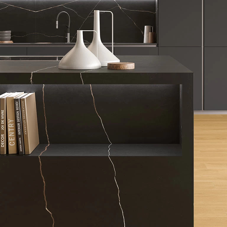 Black Atlantis quartz kitchen island with gold veining and modern styling — expert countertop fabrication by Signature Stone Las Vegas