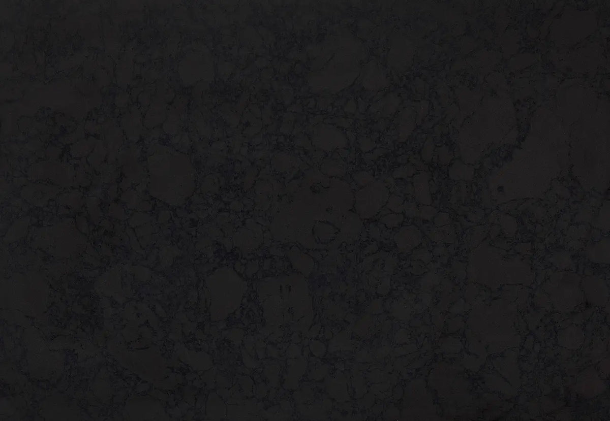 Black Rock granite surface with dark charcoal finish and subtle natural veining — custom countertops fabricated and installed by Signature Stone LV