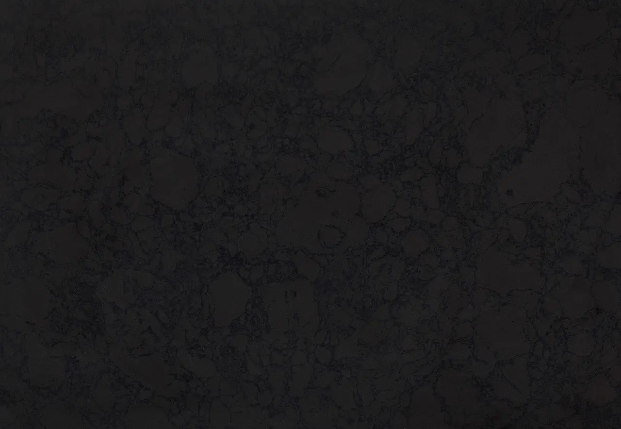 Black Rock granite surface with dark charcoal finish and subtle natural veining — custom countertops fabricated and installed by Signature Stone LV