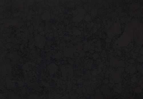 Black Rock granite surface with dark charcoal finish and subtle natural veining — custom countertops fabricated and installed by Signature Stone LV
