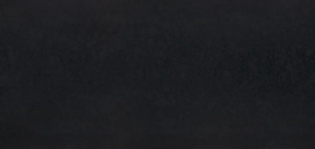 Black Rock granite surface with deep charcoal finish and subtle mineral veining — expert countertop fabrication by Signature Stone Las Vegas