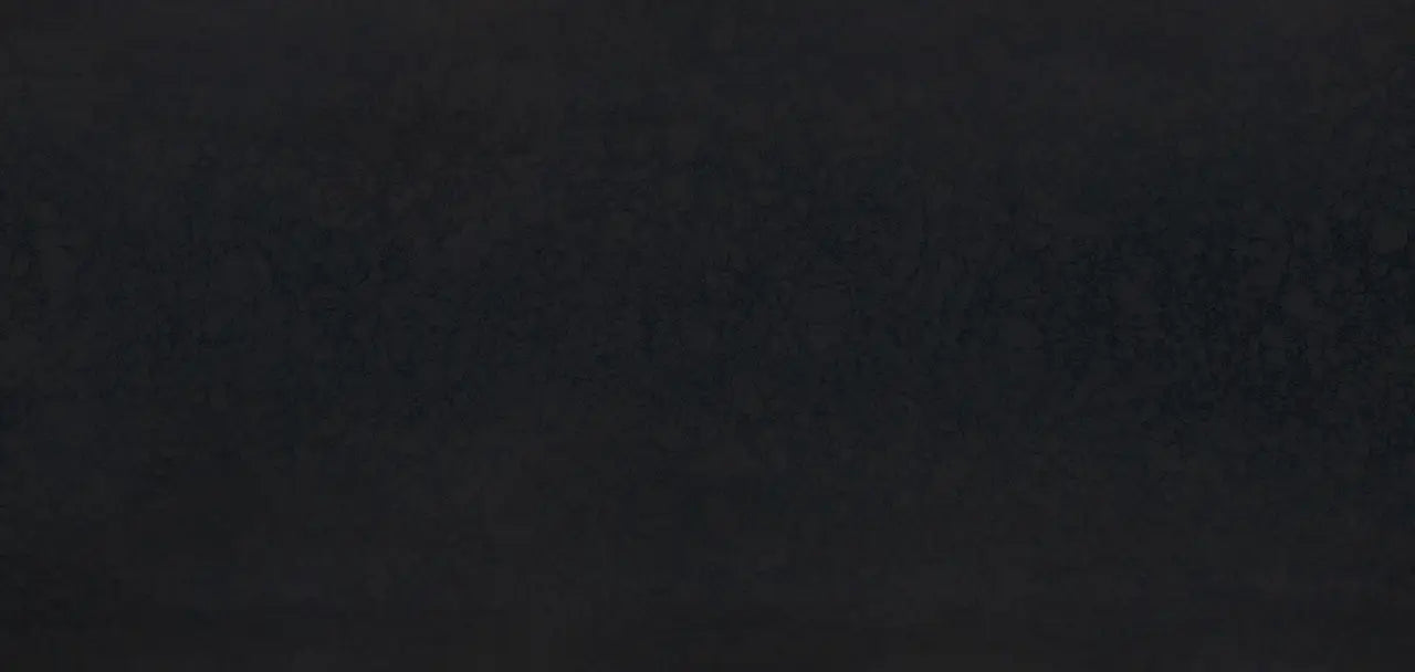 Black Rock granite surface with deep charcoal finish and subtle mineral veining — expert countertop fabrication by Signature Stone Las Vegas
