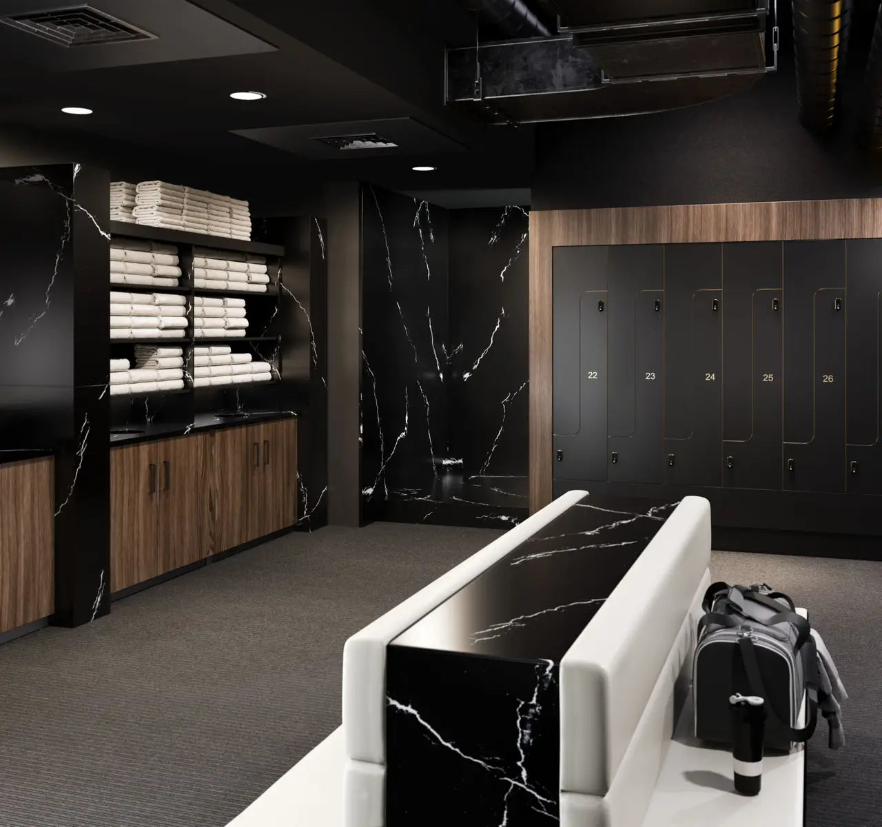 Blackbrook quartz locker room benches with black marble veining and sleek edges — luxury stone countertops installed by Signature Stone Las Vegas