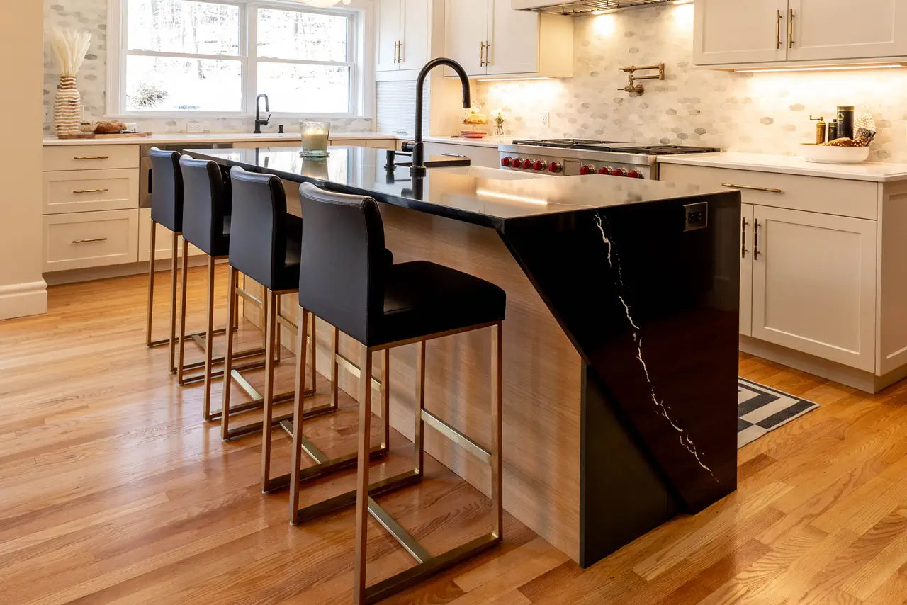 Blackbrook quartz kitchen island with dramatic black veining and waterfall edge — elegant stone countertops installed by Signature Stone Las Vegas