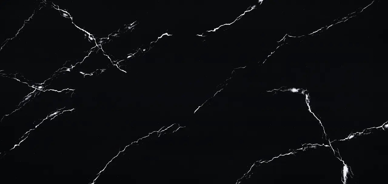 Black marble surface with white veining pattern and polished finish — premium countertop fabrication by Signature Stone Las Vegas