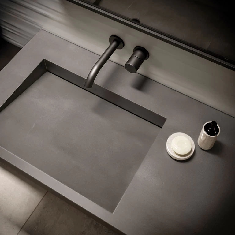Quartz bathroom vanity with integrated rectangular sink and matte gray finish — modern stone countertops installed by Signature Stone Las Vegas