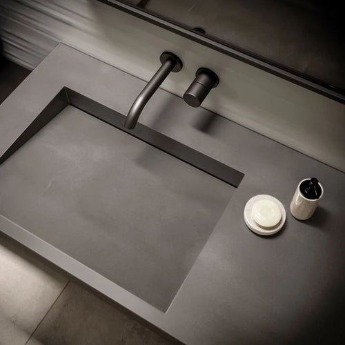 Quartz bathroom vanity with integrated rectangular sink and matte gray finish — modern stone countertops installed by Signature Stone Las Vegas